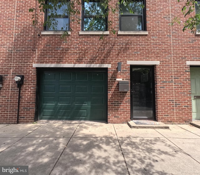 garage with driveway