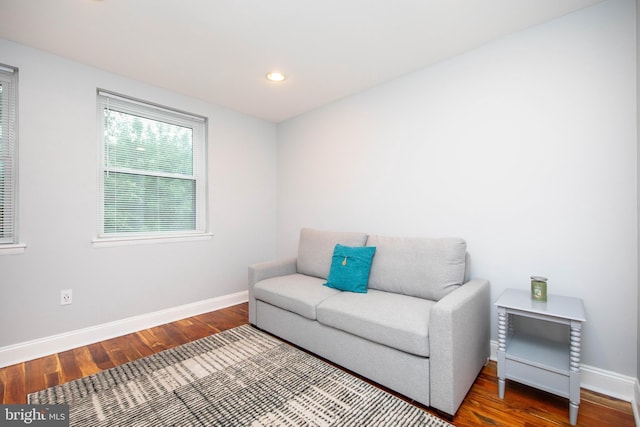 sitting room with recessed lighting, baseboards, and wood finished floors