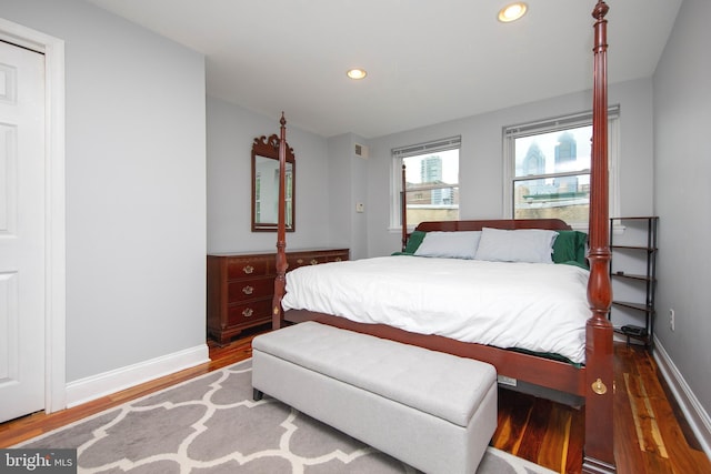 bedroom featuring recessed lighting, baseboards, and wood finished floors