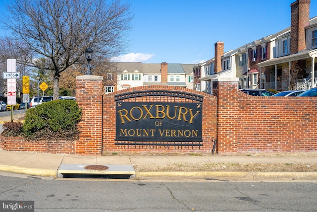 community sign with a residential view