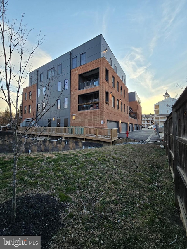 view of property at dusk