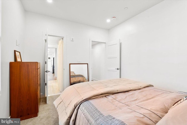 bedroom featuring recessed lighting and carpet flooring