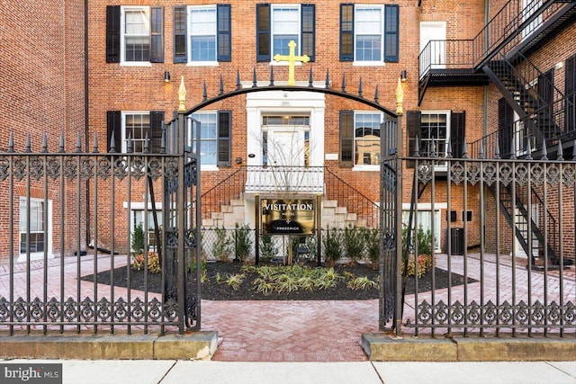 multi unit property featuring brick siding