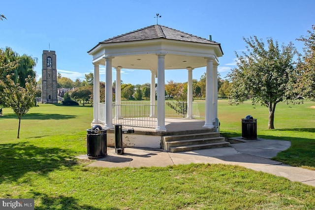 surrounding community featuring a gazebo and a lawn