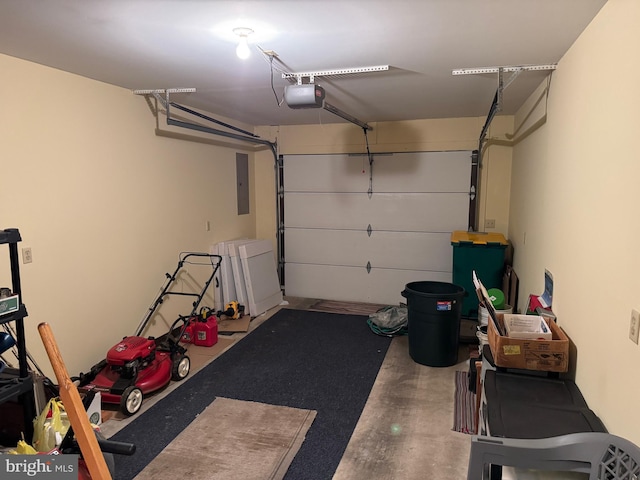 garage featuring electric panel and a garage door opener