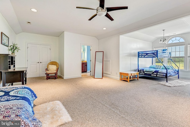 carpeted bedroom with lofted ceiling, baseboards, and recessed lighting