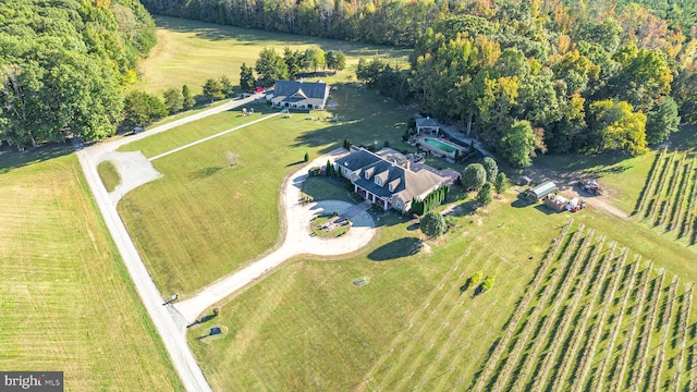 birds eye view of property featuring a rural view