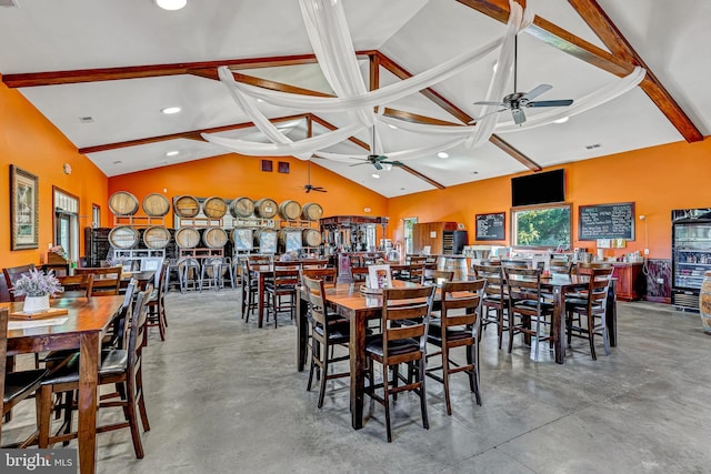 dining space with finished concrete floors, recessed lighting, beam ceiling, and ceiling fan