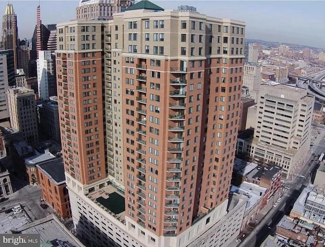 view of building exterior featuring a city view