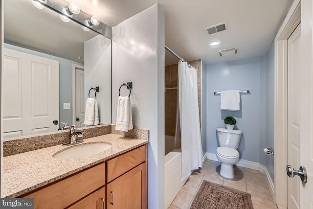 full bath featuring toilet, vanity, visible vents, and tile patterned floors