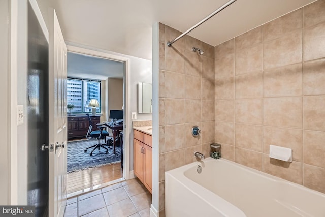 bathroom with vanity, shower / tub combination, and tile patterned floors