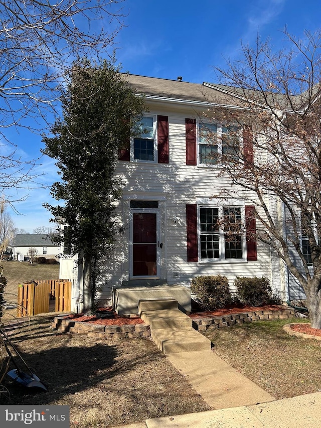 view of front of home with fence