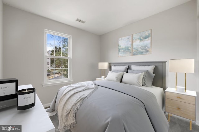 bedroom featuring carpet and visible vents