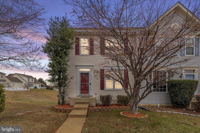 view of front of house featuring a front yard