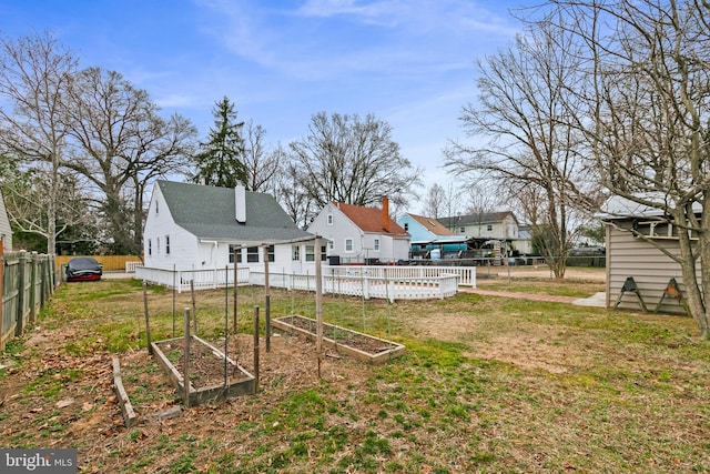 view of yard featuring a garden and fence