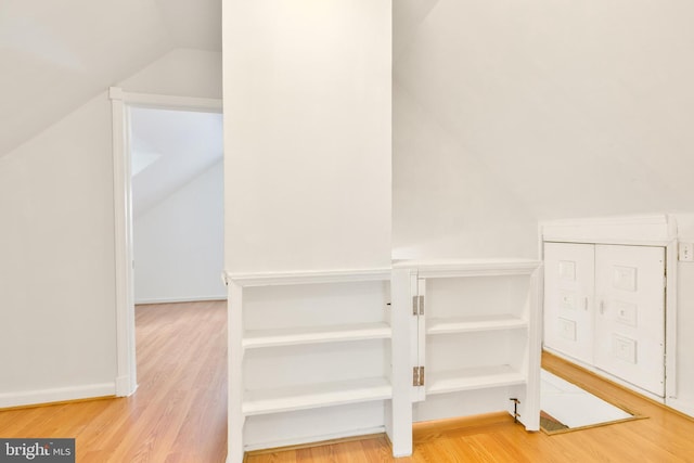 details with baseboards and wood finished floors