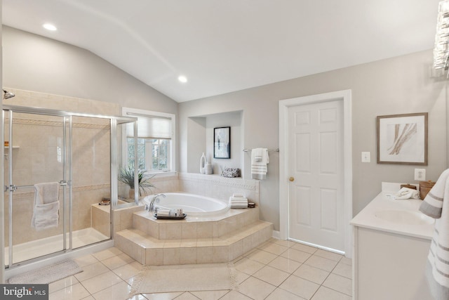 full bath featuring lofted ceiling, a shower stall, vanity, and tile patterned floors