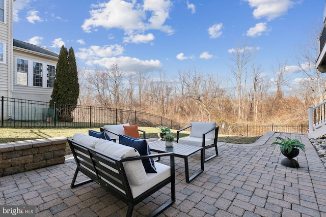 view of patio / terrace featuring a fenced backyard and an outdoor hangout area