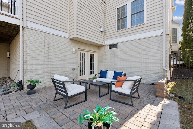 view of patio / terrace with an outdoor hangout area and french doors