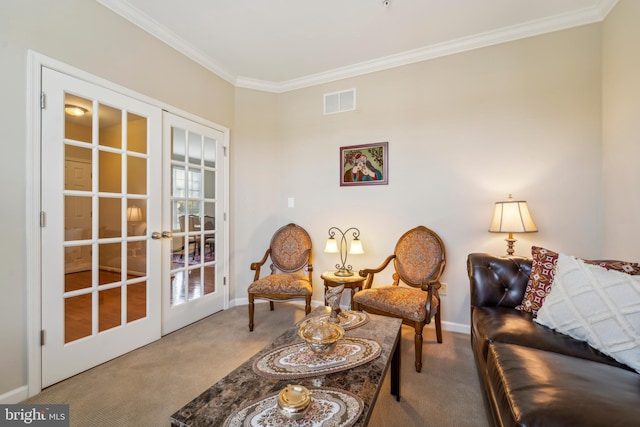 living area with carpet floors, visible vents, baseboards, french doors, and crown molding