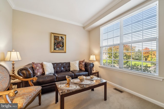 living area with baseboards, visible vents, crown molding, and light colored carpet