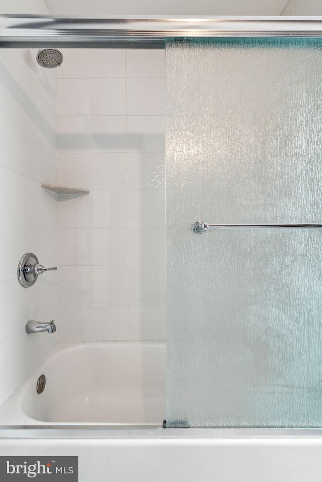 full bath featuring shower / bathtub combination