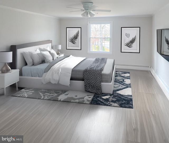 bedroom with ceiling fan, ornamental molding, wood finished floors, and baseboards