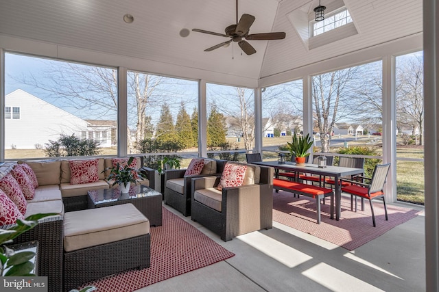 sunroom / solarium featuring vaulted ceiling and ceiling fan