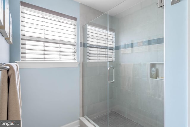 bathroom with a stall shower