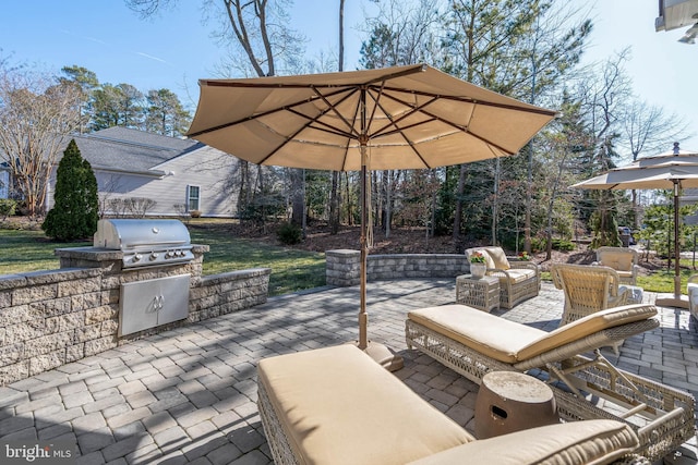 view of patio / terrace with outdoor lounge area and area for grilling