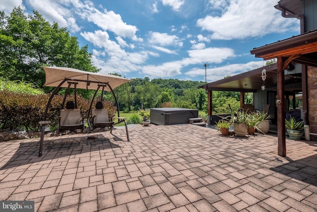 view of patio featuring a hot tub