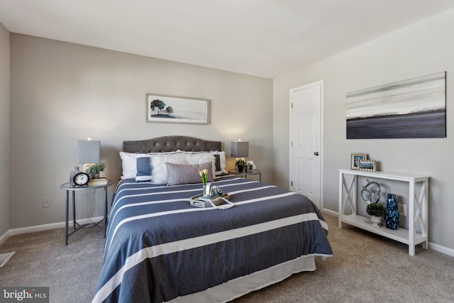 bedroom with carpet flooring, visible vents, and baseboards