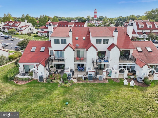 birds eye view of property with a residential view