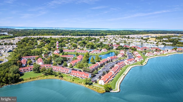 birds eye view of property featuring a water view and a residential view