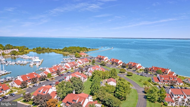 aerial view featuring a residential view and a water view