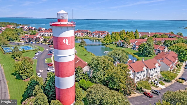 bird's eye view with a water view and a residential view