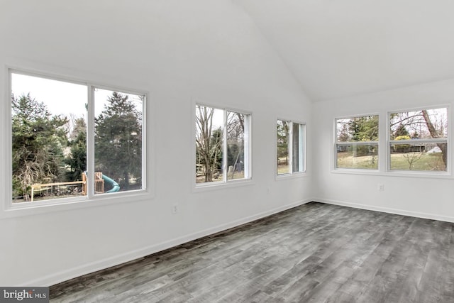 unfurnished sunroom featuring lofted ceiling