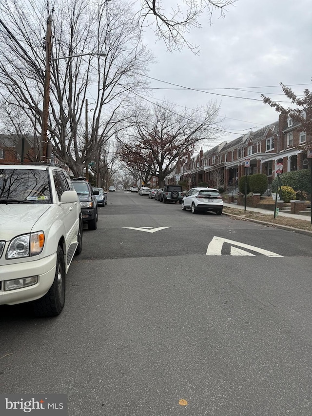 view of road featuring curbs and sidewalks