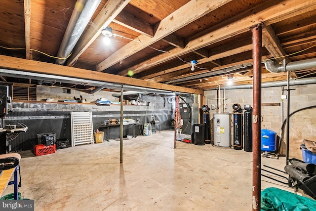 unfinished basement featuring water heater and heating unit