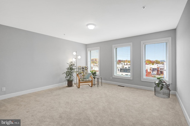 927 12th St NE, Washington, DC 20002 - sitting room with carpet, visible vents, and baseboards