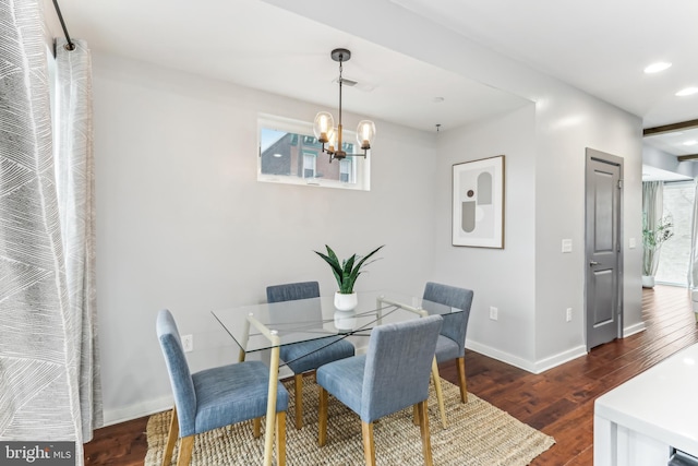 dining room featuring dark wood-style floors, recessed lighting, visible vents, a chandelier, and baseboards