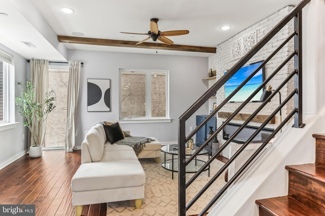 interior space featuring recessed lighting, visible vents, a ceiling fan, wood finished floors, and baseboards