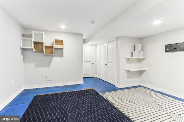 interior space featuring recessed lighting and baseboards