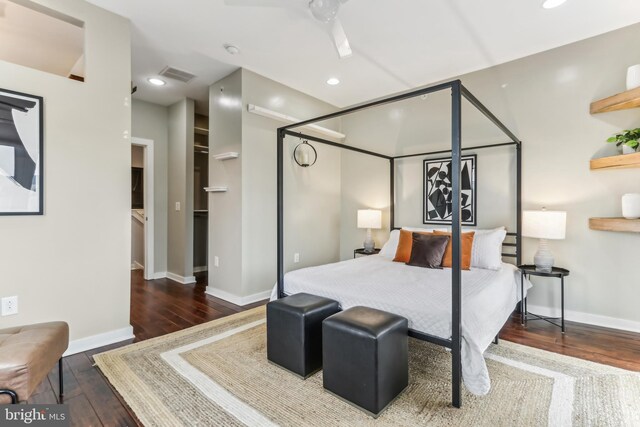 bedroom with recessed lighting, wood-type flooring, visible vents, and baseboards