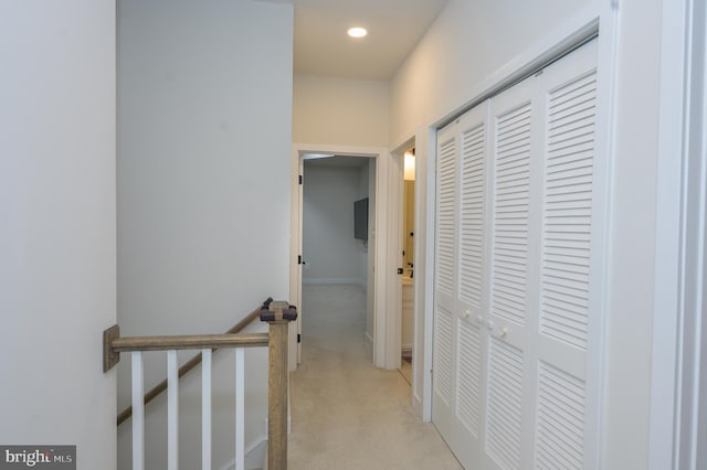 corridor featuring recessed lighting and light colored carpet