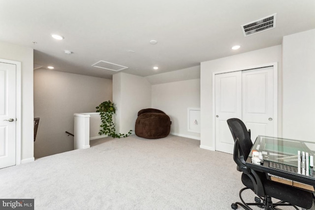 carpeted office space with baseboards, visible vents, and recessed lighting