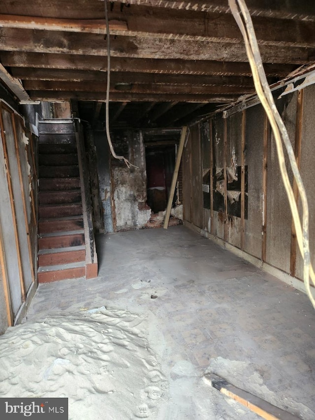 unfinished basement with stairs