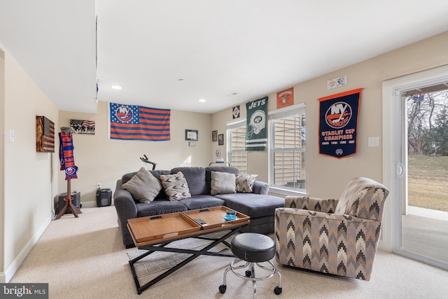 living area with carpet floors, baseboards, and recessed lighting