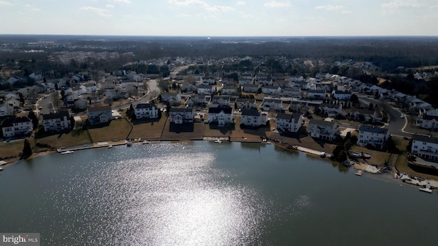 aerial view featuring a water view and a residential view