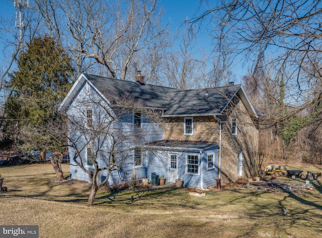 521 Brightfield Rd, Lutherville Timonium, MD 21093 - view of front of home with a chimney and a front lawn